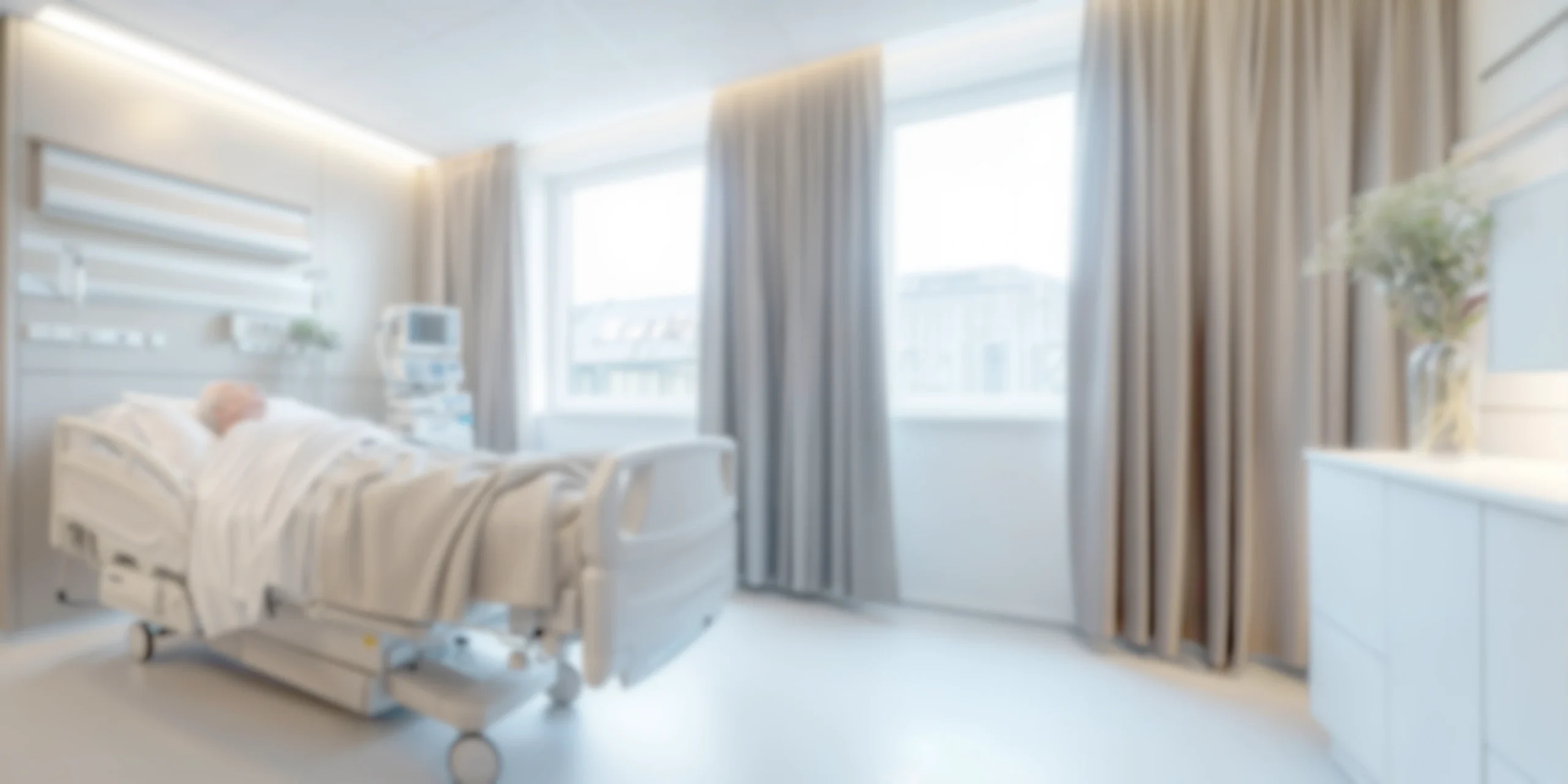 Chambre d'hôpital avec lit médicalisé